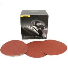 Course cut 5" Grip circular shaped sandpaper.